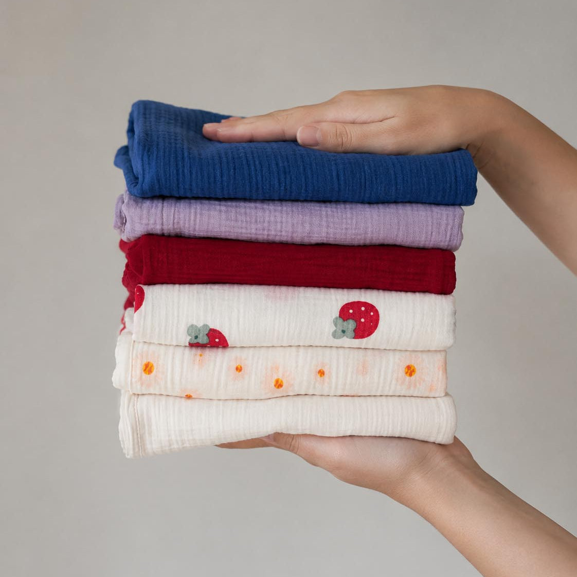 Tiny Ones Club soft muslin baby swaddle blanket
